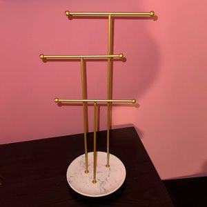Gold and marble jewelry stand